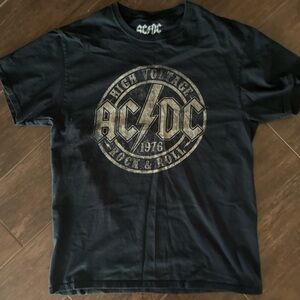 Lightly Used AC/DC High Voltage Rock & Roll T-Shirt. Men’s medium (runs small)